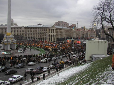 Crowds with orange flags fill Kyiv's Independence Square during the Orange Revolution, November 2004